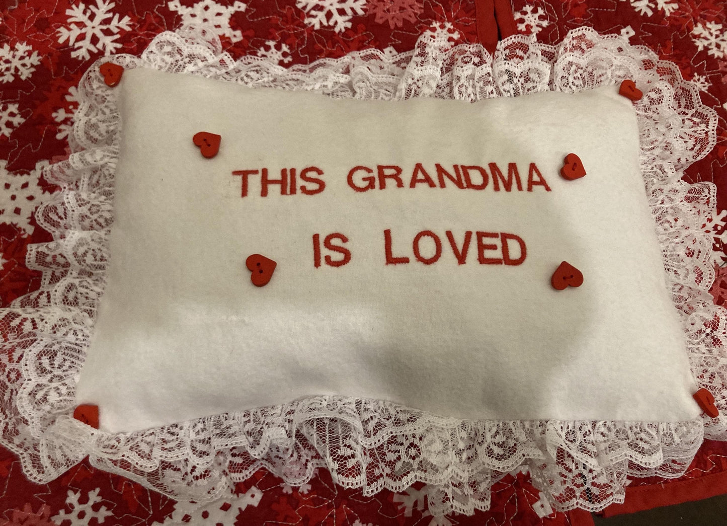 Grandma pillow embroidered in red