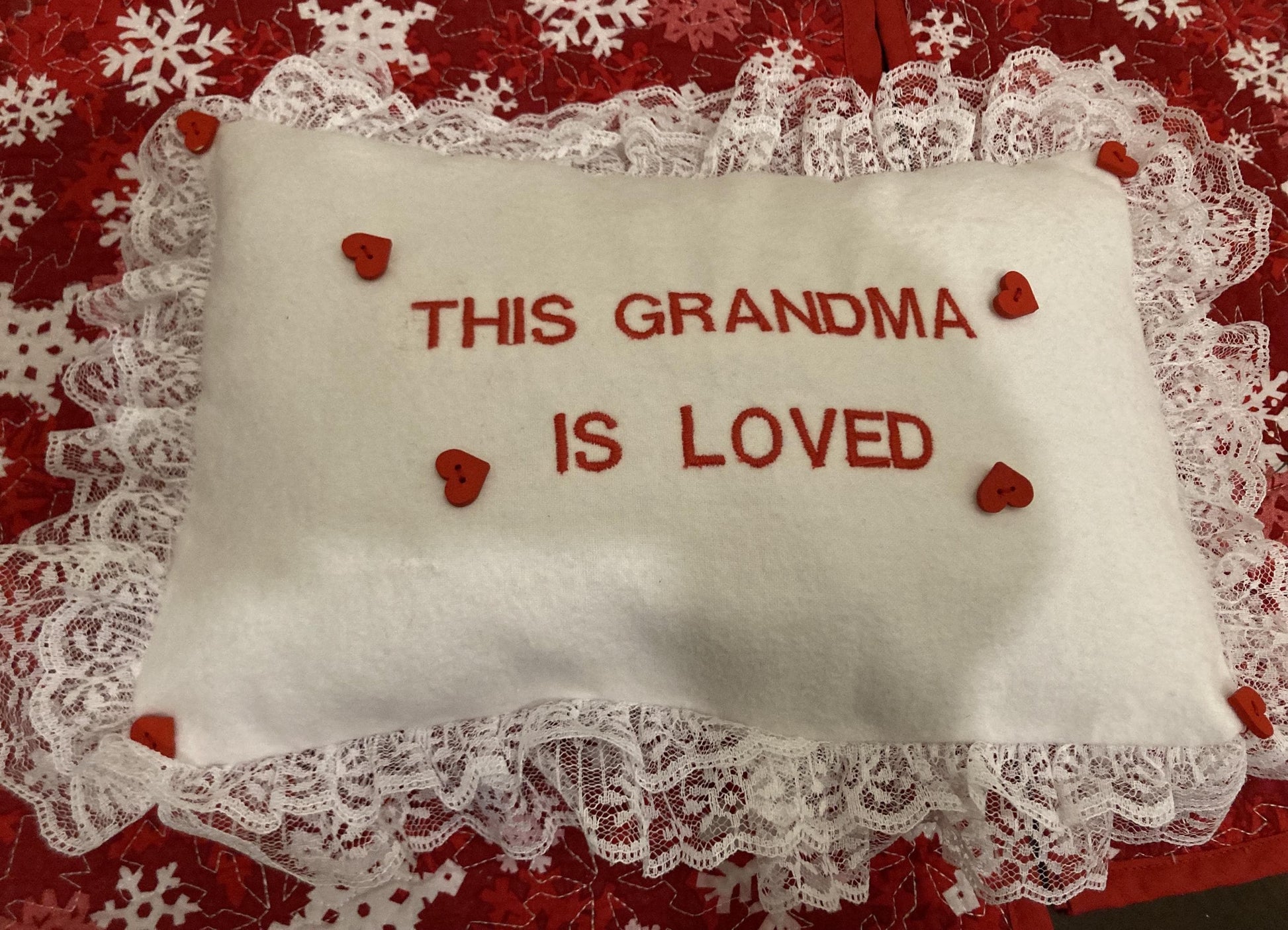 Grandma pillow embroidered in red