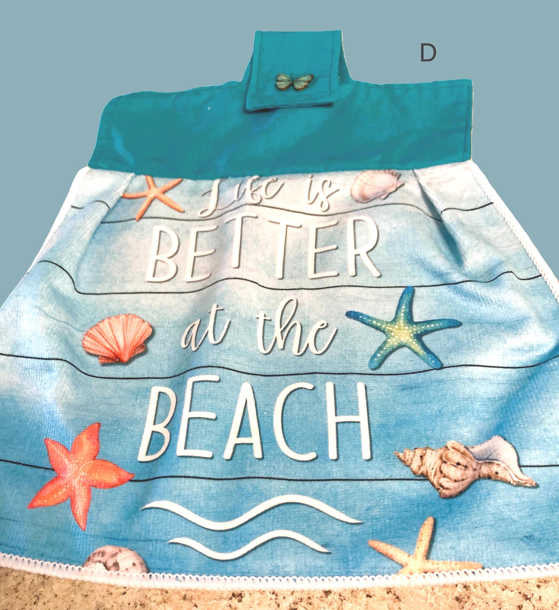 HELLO SUMMER! at the beach or ocean hanging towels