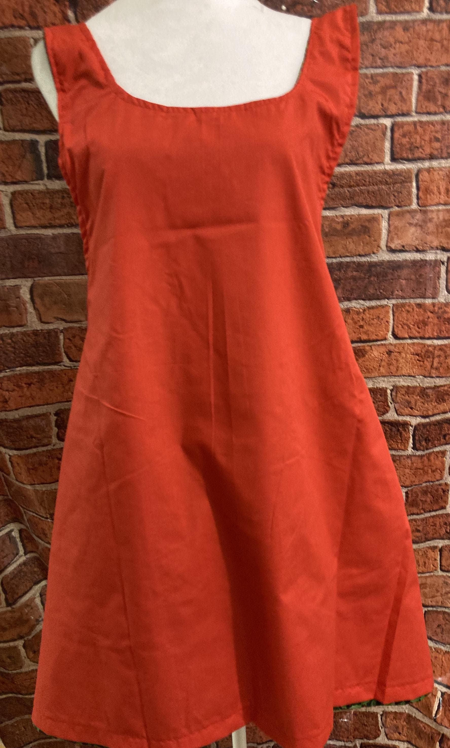 HOLLY LEAVES BERRIES Green and red on a reversible cross back apron